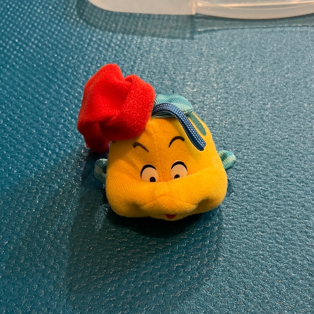 Yellow Plush Toy with Red Hat